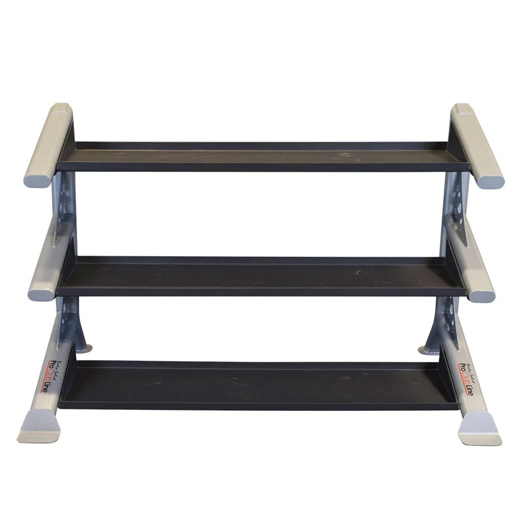 The Body-Solid Pro ClubLine Storage Rack with Kettlebell Tiers is a black, three-tiered rack crafted from heavy gauge steel with silver metal side supports. The parallel, evenly spaced tiers make it ideal for weights, while the wider bottom ensures stability and a sleek modular design.