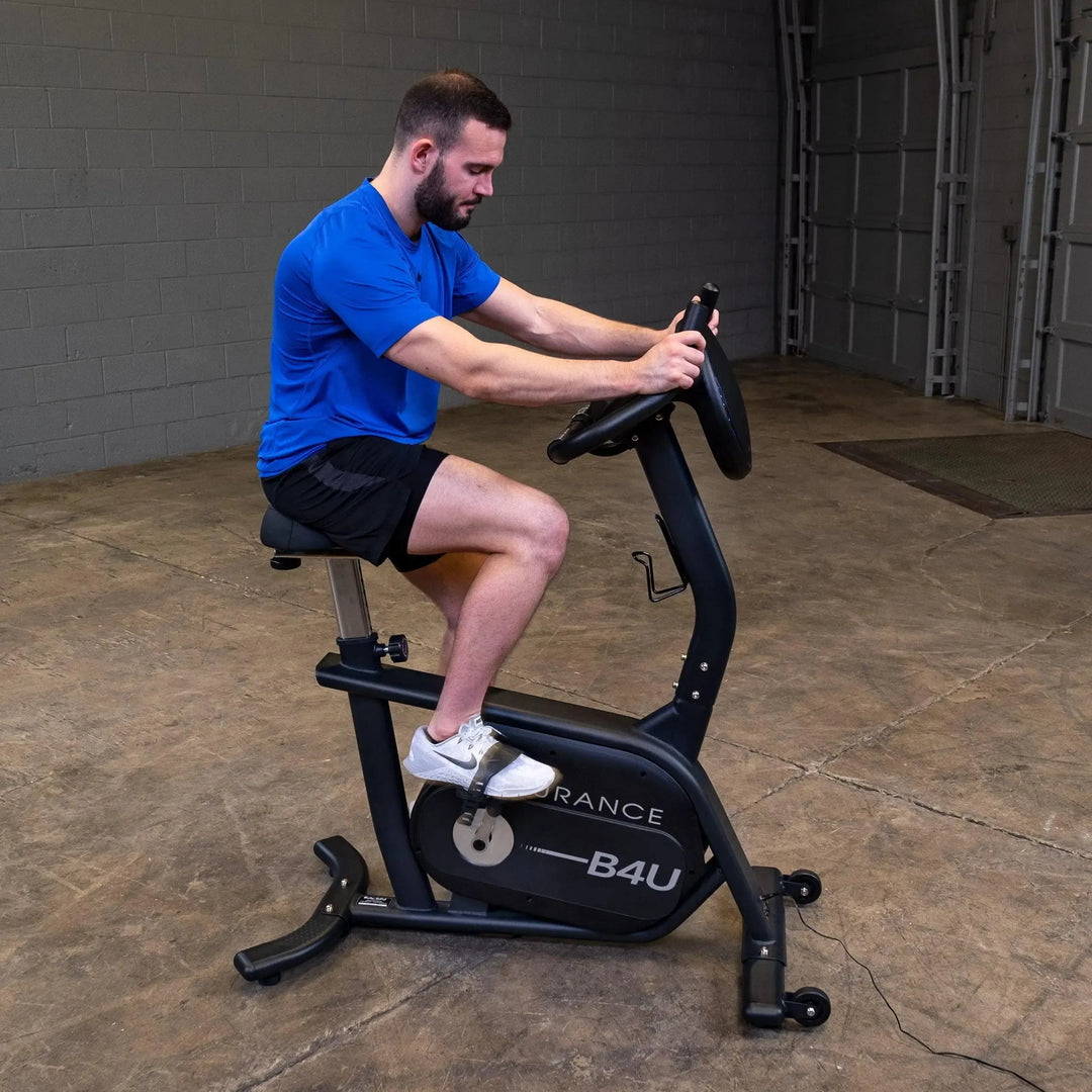 man riding the Endurance Commercial Upright Bike B4UB