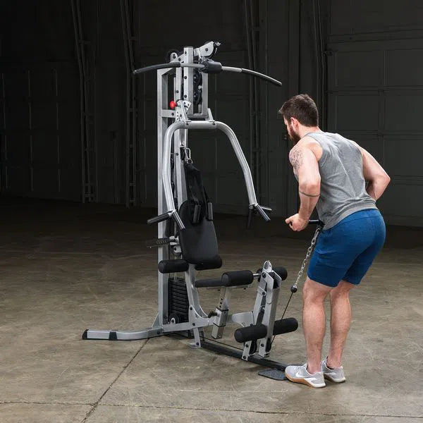 man bent over row exercise on Body-Solid Powerline Home Gym with Leg Press