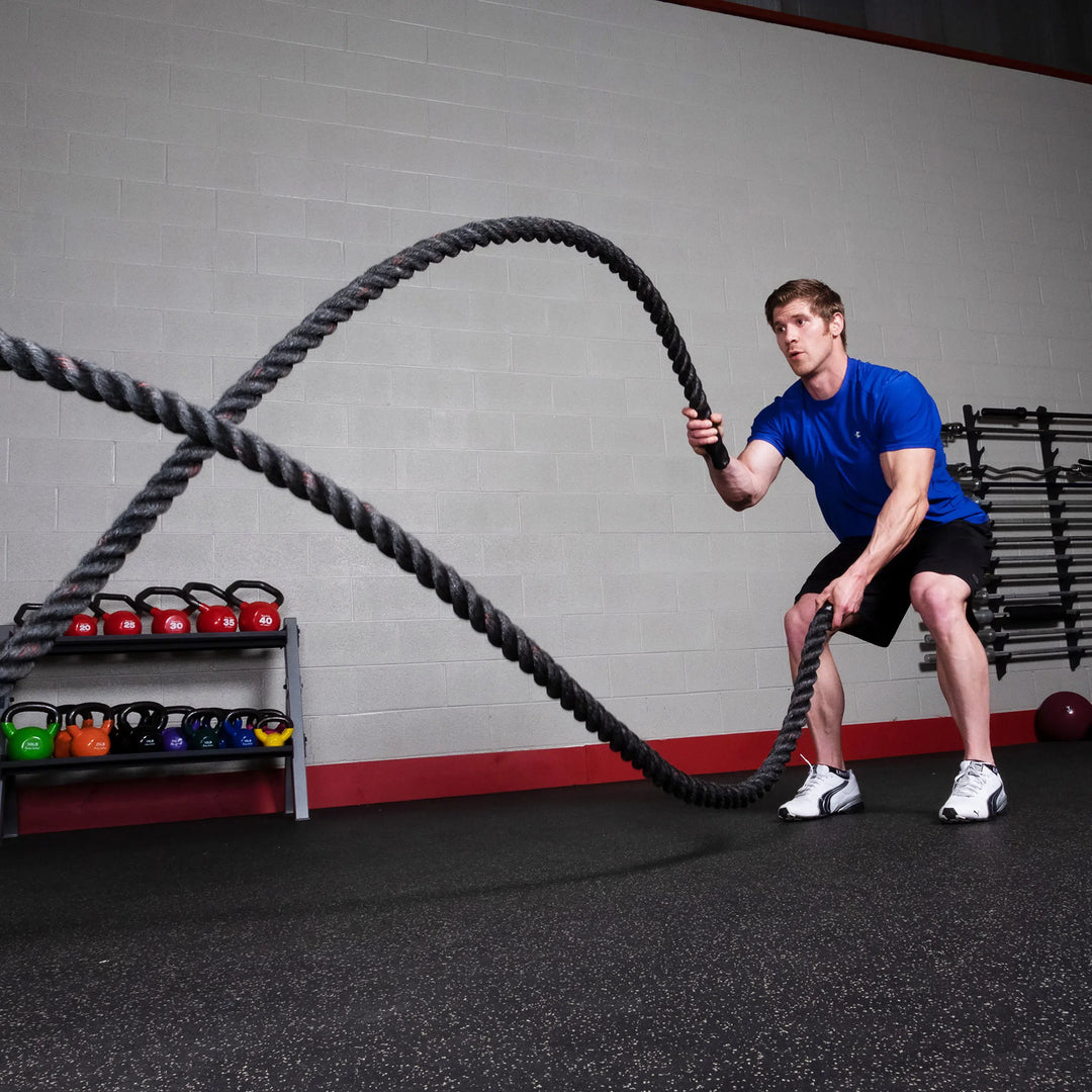 man workout with Body-Solid Gym Battle Ropes BSTBR