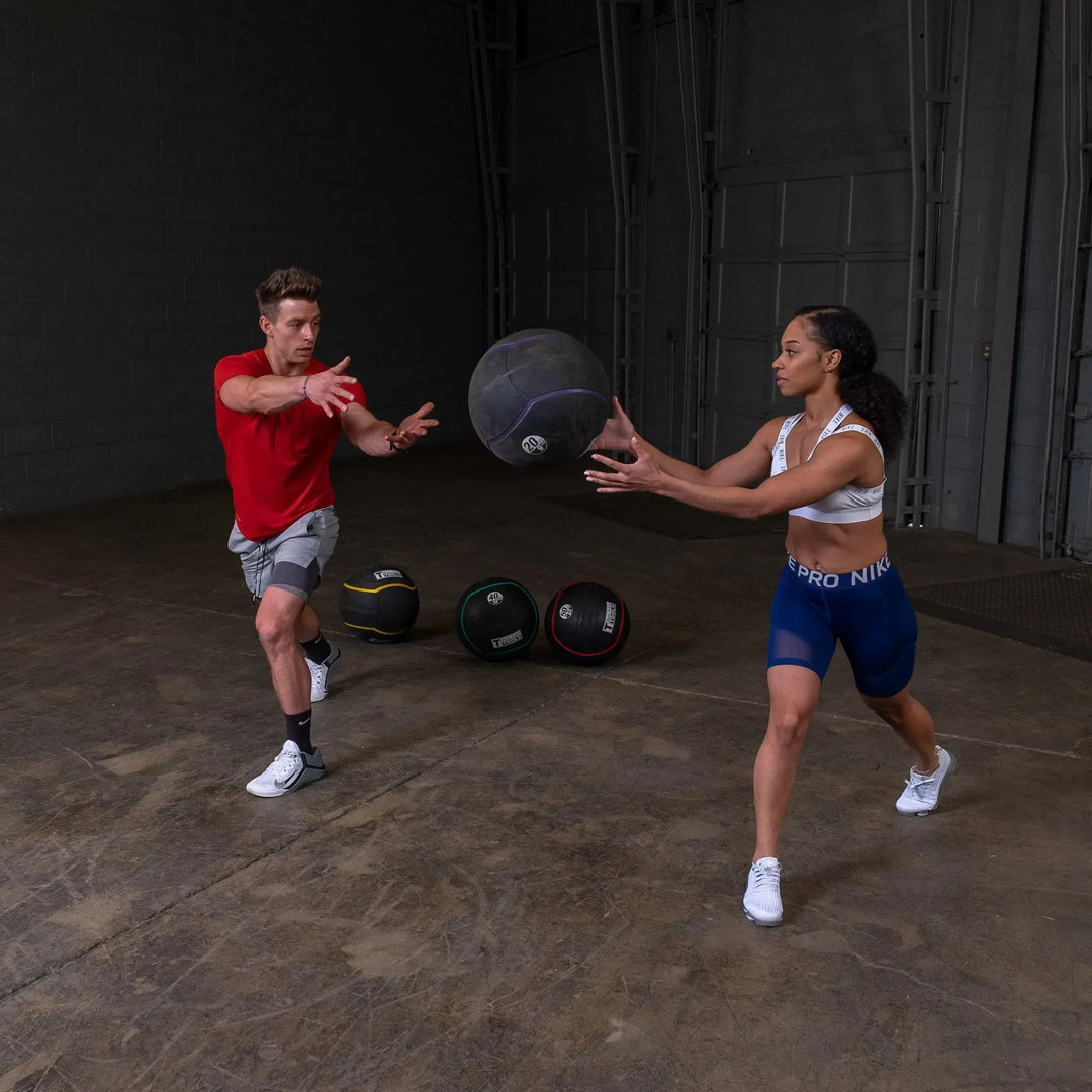 partner ball toss workout with Body-Solid Heavy Rubber Balls BSTHRB