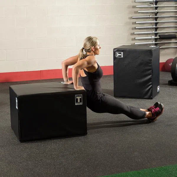 woman doing dips on the Body-Solid Soft Plyo Box BSTSPBOX