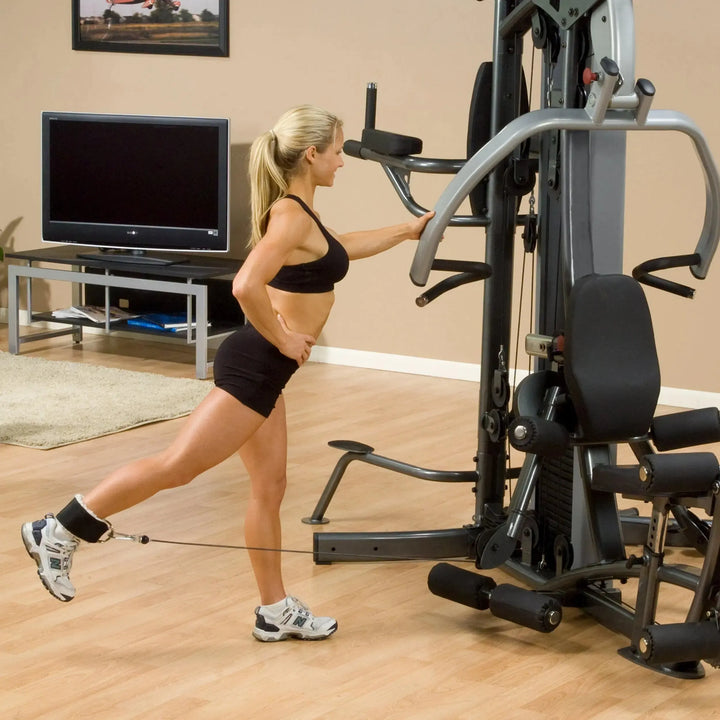 woman cable glute kickback workout on Body-Solid Fusion Commercial Exercise Machine F500