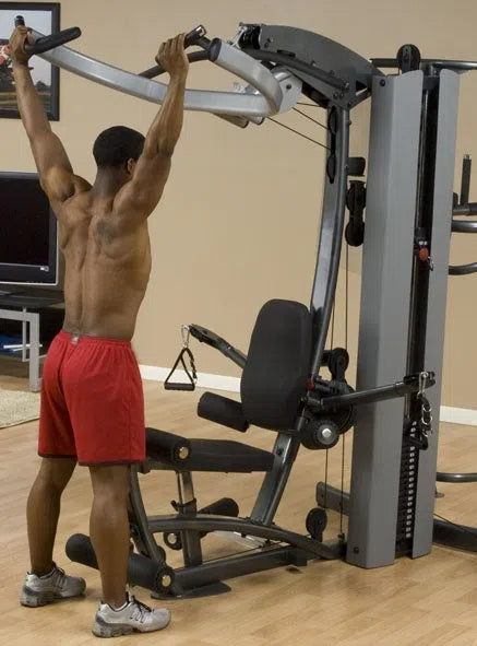 man lat pull down workout on Body-Solid Fusion Commercial Exercise Machine F500