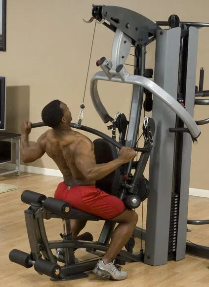 man bar lat pull down workout on Body-Solid Fusion Commercial Exercise Machine F500