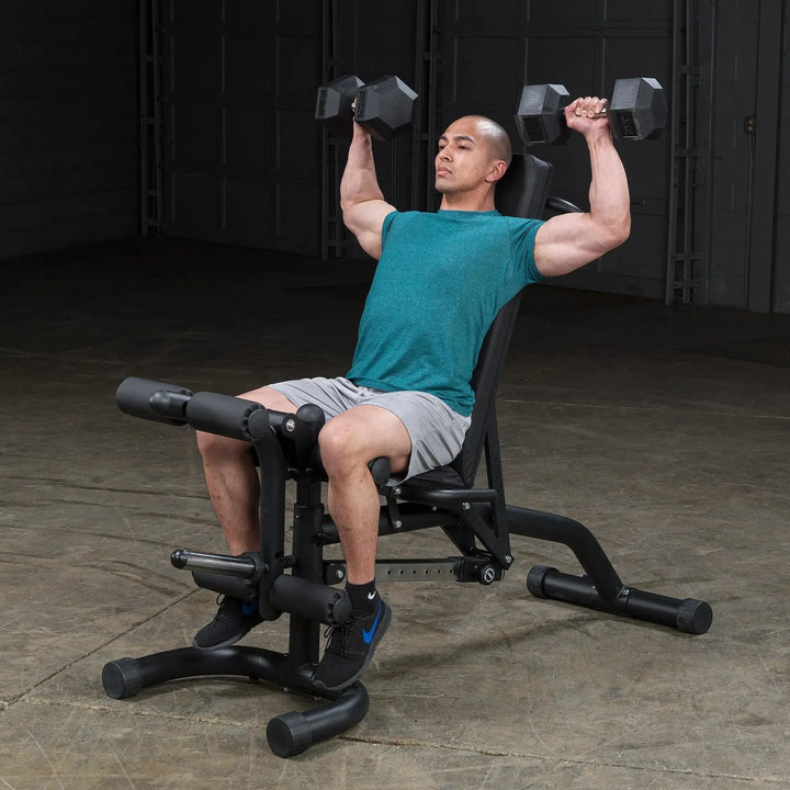 man dumbbell shoulder press workout on Body-Solid Adjustable Weight Bench with Leg Extension & Leg Curl FID46
