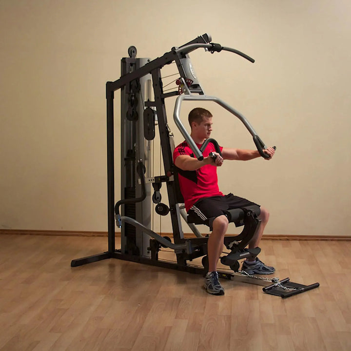 man seated chest press exercise on Body-Solid Compact Weight Machine G5S