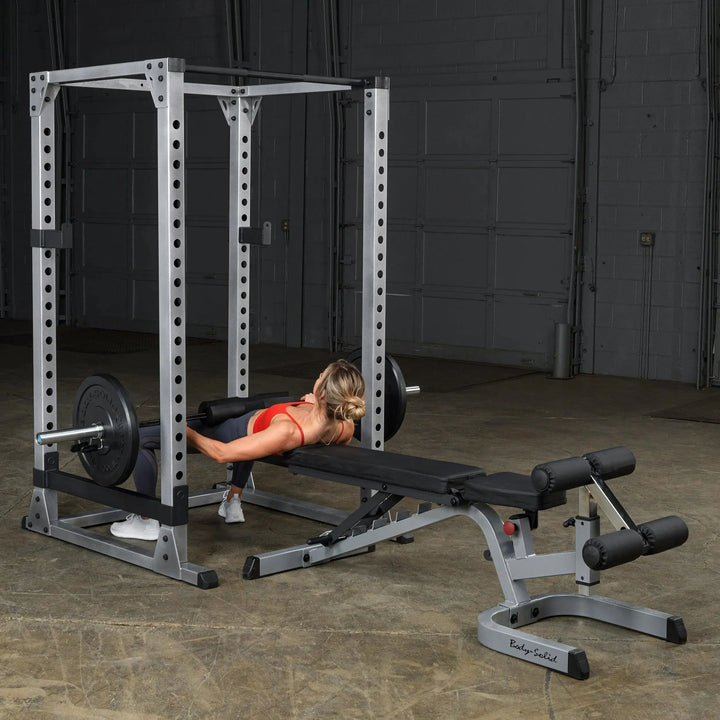 woman barbell hip thrust exercise on Body-Solid Power Rack Set GPR378P4