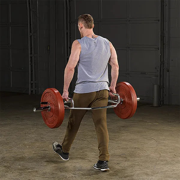 man farmers walk exercise on Body-Solid High Handle Trap Bar OTB50RH