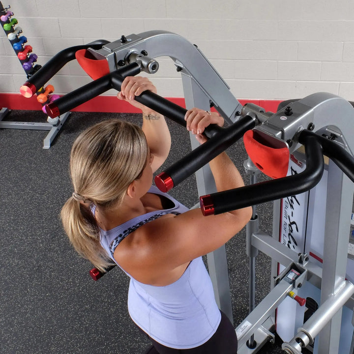 woman chin-up exercise on Body-Solid Assisted Pull Up Machine S2ACD