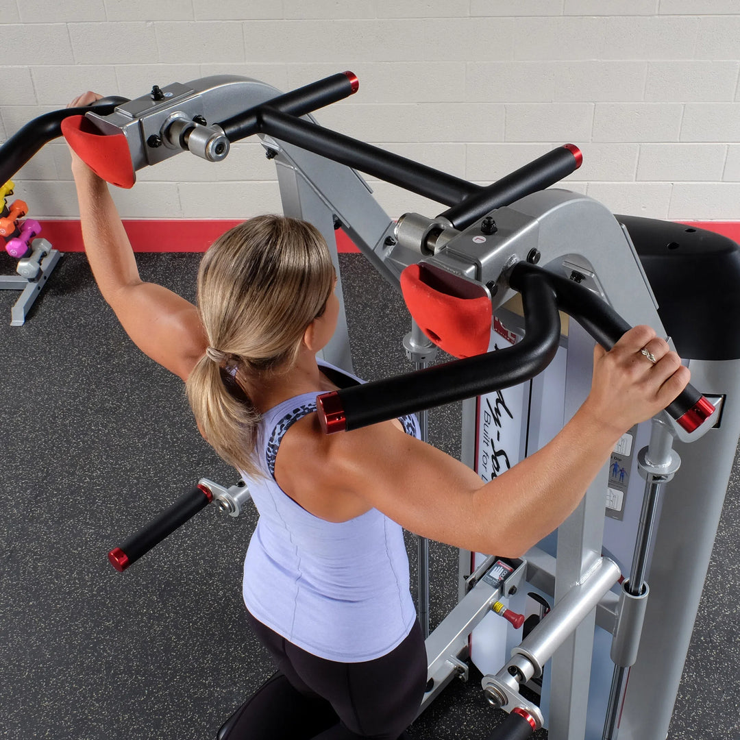 woman wide grip pull up on Body-Solid Assisted Pull Up Machine S2ACD