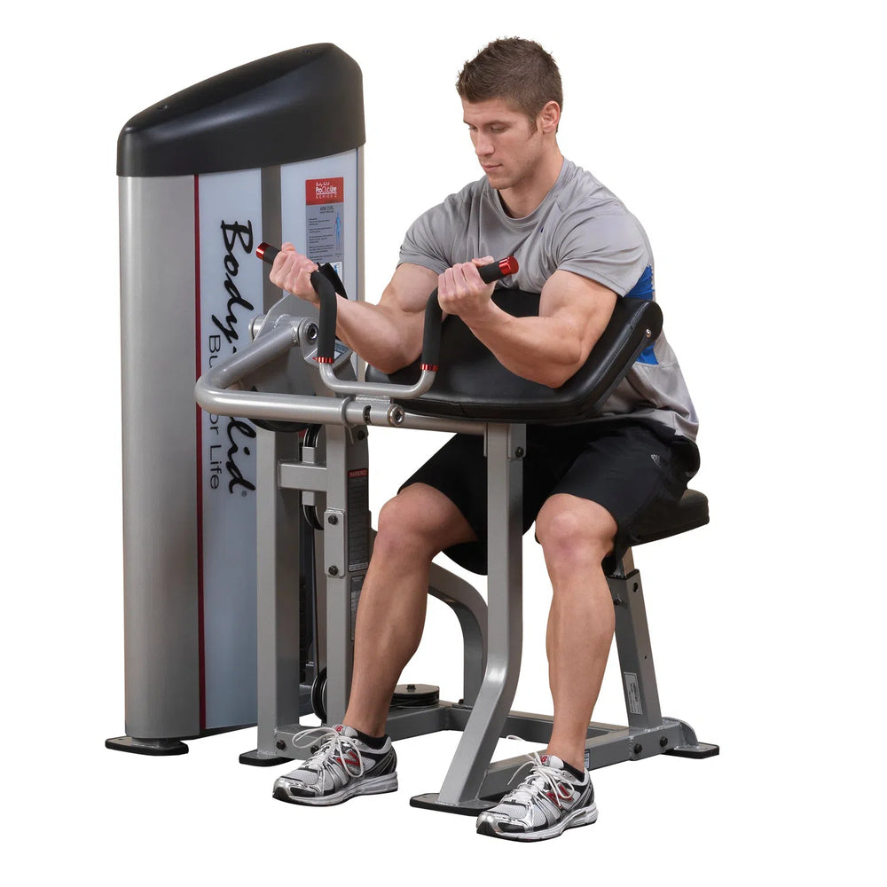 man seated bicep curl exercise on Body-Solid Preacher Curl Machine S2AC