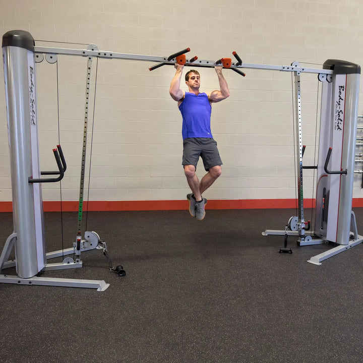 man pull-ups workout on Body-Solid Commercial Cable Crossover Machine S2CCO