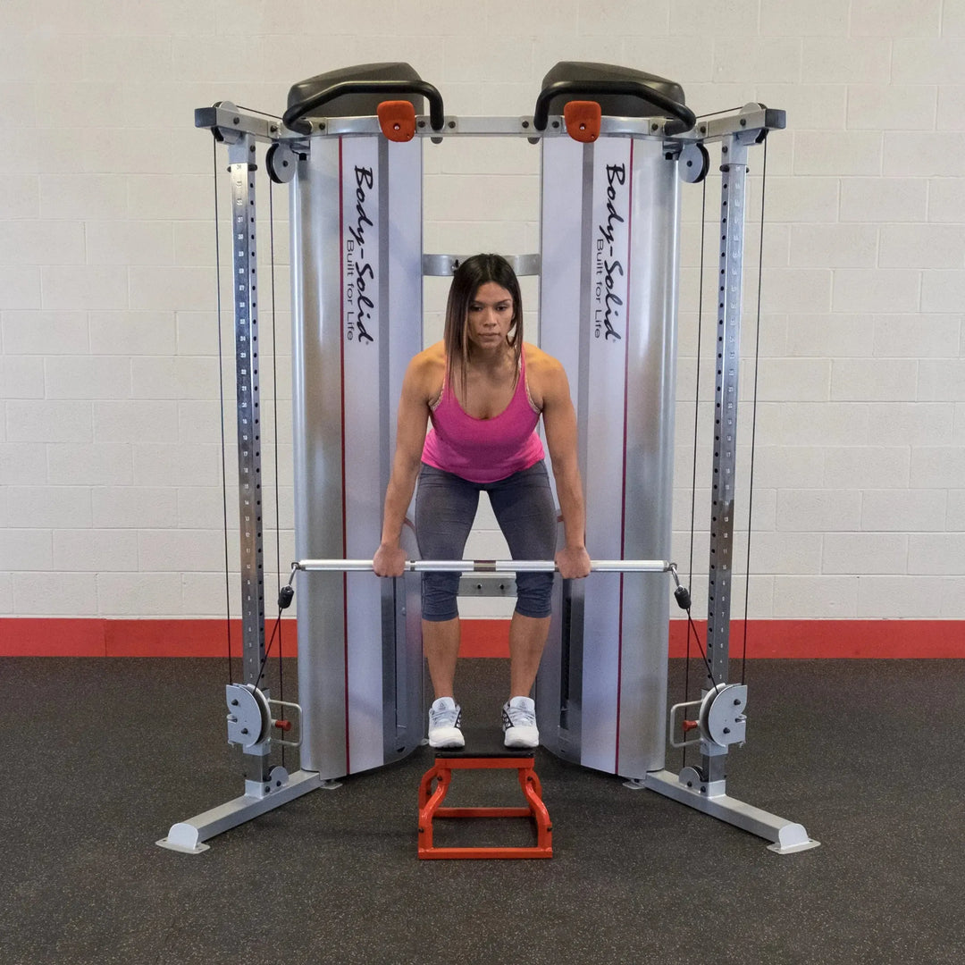 woman plyo box bent over row exercise on Body-Solid Commercial Functional Trainer S2FT