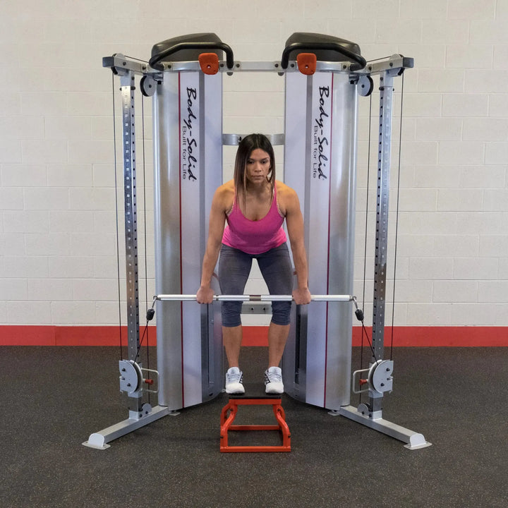 woman plyo box bent over row exercise on Body-Solid Commercial Functional Trainer S2FT