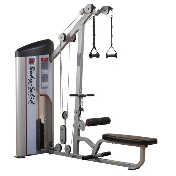 The Body-Solid Pro Clubline Lat Pulldown and Row Machine (S2LAT) is a silver and black multifunctional machine with overhead and seated cable pulleys, padded bench, adjustable weights, and assorted grips for comprehensive strength training exercises.