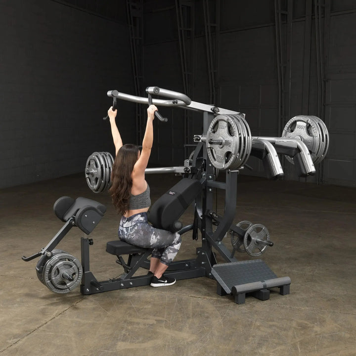 woman lat pulldown workout on Body-Solid Freeweight Leverage Gym SBL460P4