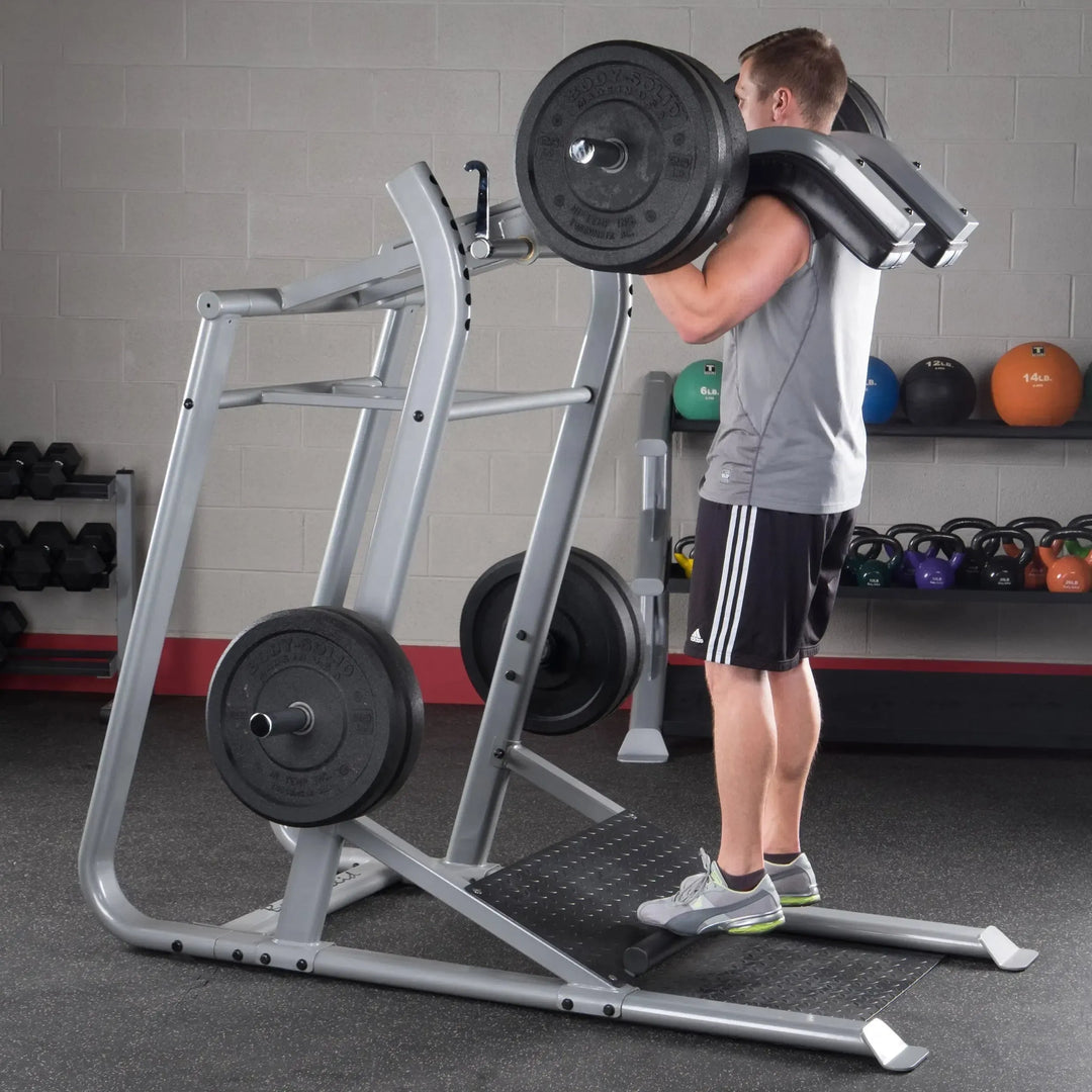 A man doing calf raises on the Body-Solid Leverage Squat Machine SLS500