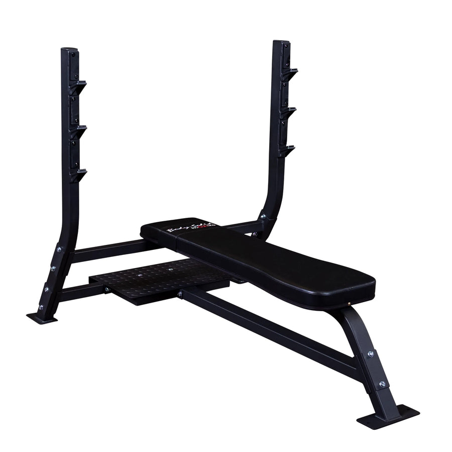 The Body-Solid Pro Clubline Olympic Flat Bench (SOFB250) by Body-Solid Pro Clubline is ideal gym equipment for any fitness facility. It features a padded bench on metal legs and an attached squat rack with multiple weight hooks, making it perfect for strength training sessions.