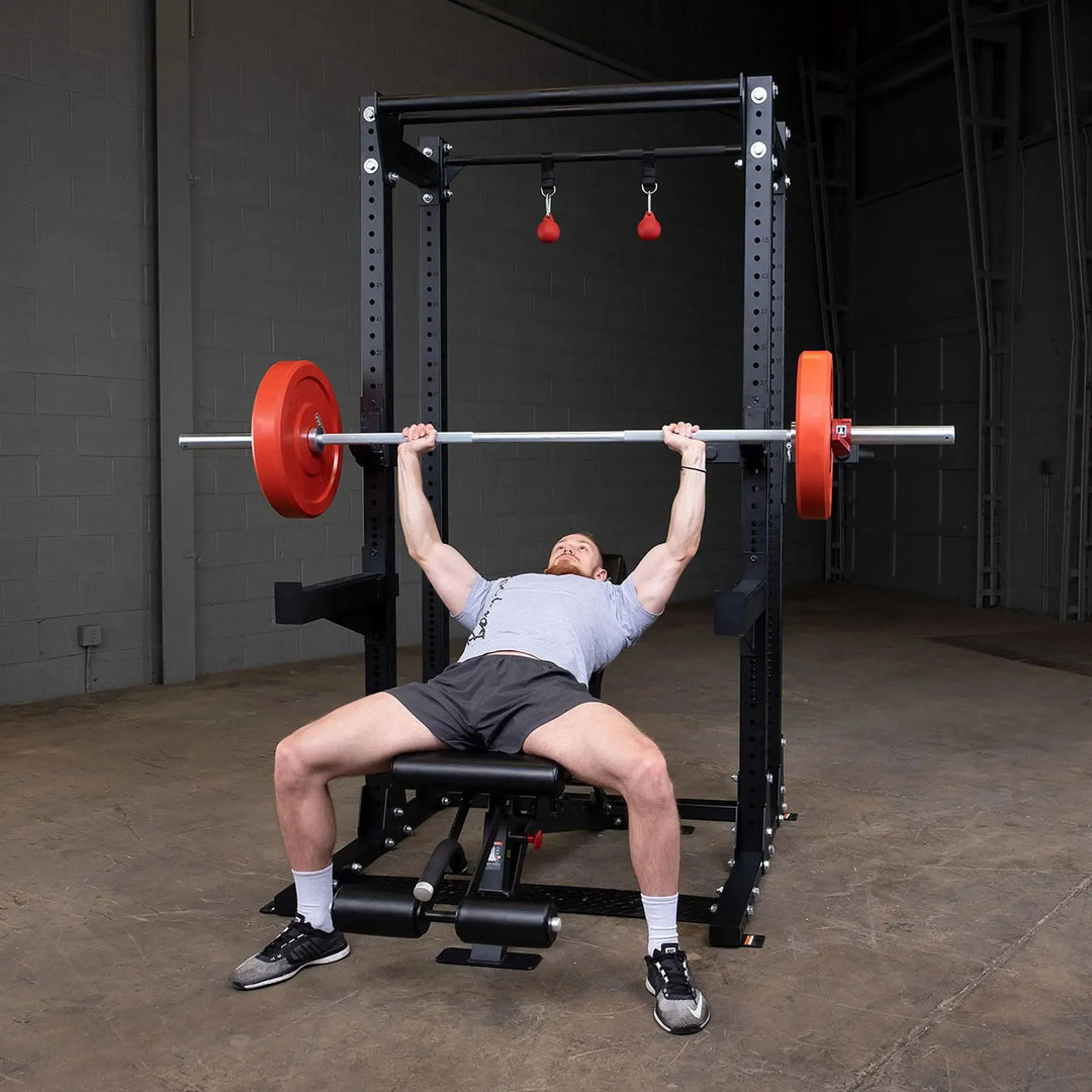 man incline bench press workout on Body-Solid Half Power Rack Extended SPR500BACK