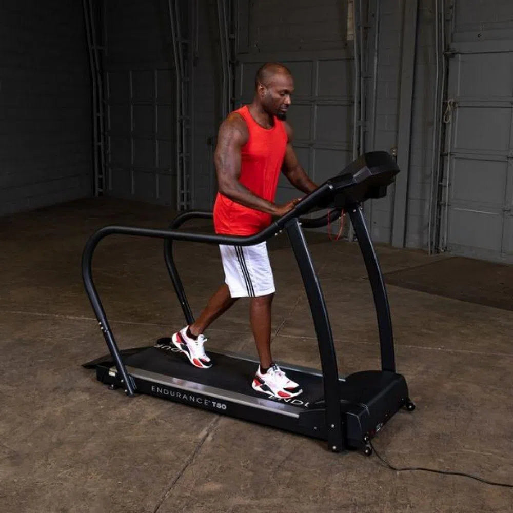 man walking workout on the Body-Solid Endurance Walking Treadmill T50
