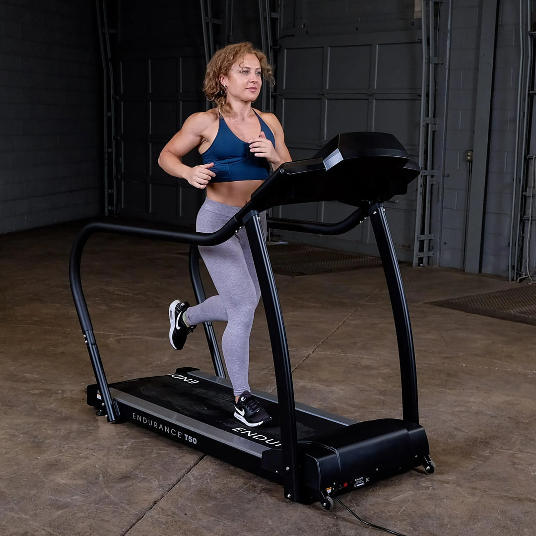 fit girl speed walking on Body-Solid Endurance Walking Treadmill T50