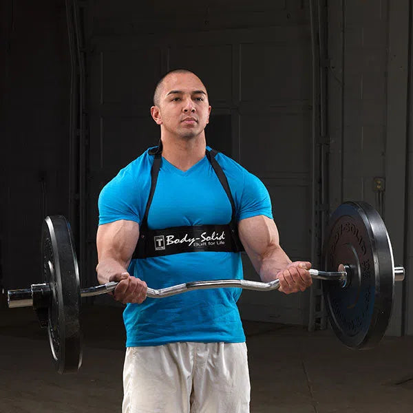 A man training with the Body-Solid Olympic EZ Curl Bar OB47