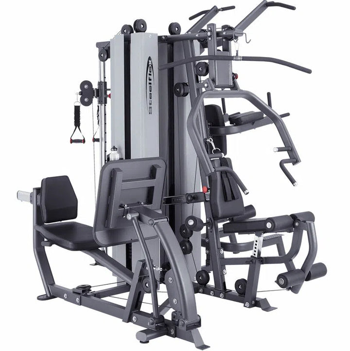 The Steelflex All-In-One Workout Machine (MG300B) features stations for chest press, lat pulldown, leg extension, and seated row. Designed with commercial-quality metal frames and padded seats, it provides a comprehensive full-body workout experience.