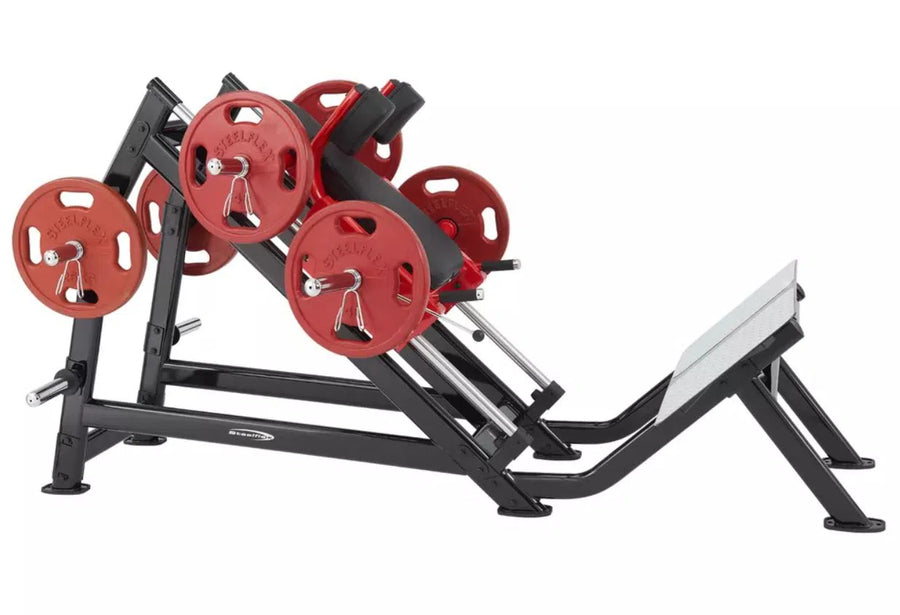 The SteelFlex Hack Squat Machine (PLHP) features a black metal frame and red weight plates, perfect for commercial fitness centers. Designed by Steelflex for strength training, it provides an effective lower body workout with its ergonomic seat and foot platform.
