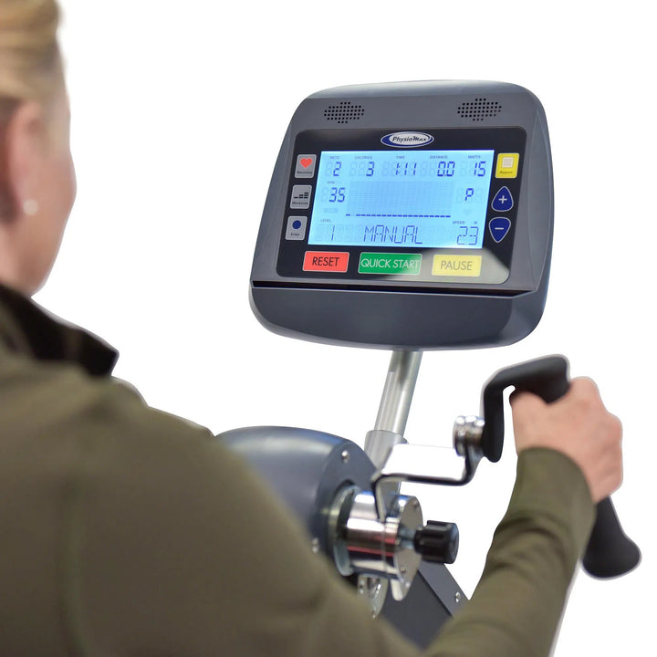 senior woman rehab on HCI PhysioMax Arm Ergometer and Recumbent Bike TBT-1000