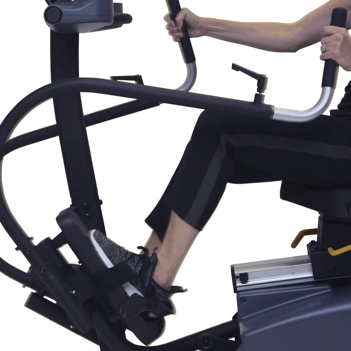 HCI VersaStep Elliptical Bike VSX Muscle Recovery Physical Rehabilitation Physiotherapy Training Healthy and Safe WorkoutaA woman training on the HCI VersaStep Elliptical Bike VSX