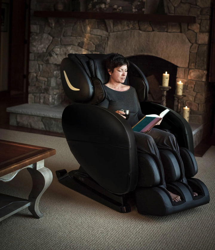 A woman relaxing in the Infinity Smart X3 Full Body Massage Chair