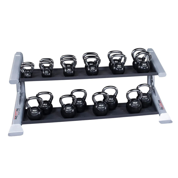 Body-Solid Pro Clublines Pro ClubLine Storage Rack w/ Kettlebell Tiers is a stylish, modular design built from heavy gauge steel. It features two tiers holding six black kettlebells each in kilograms, with a sleek black and gray finish.