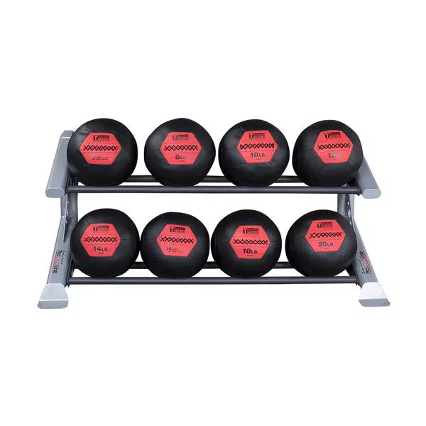 The Body-Solid Pro Clublines Pro ClubLine Modular Storage Rack features a sleek gray and black finish and holds eight black medicine balls with red labels, displaying weight in pounds from 8 to 20, stored in evenly spaced compartments across two tiers.
