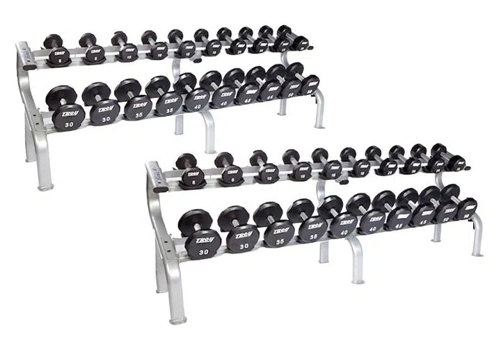 The TROY Barbell Troy 5-100 lb Urethane Commercial Dumbbell Set w/ Rack features two multi-tier gym racks with durable black dumbbells marked from 5 to 50 lbs, offering an organized and ideal fitness solution.