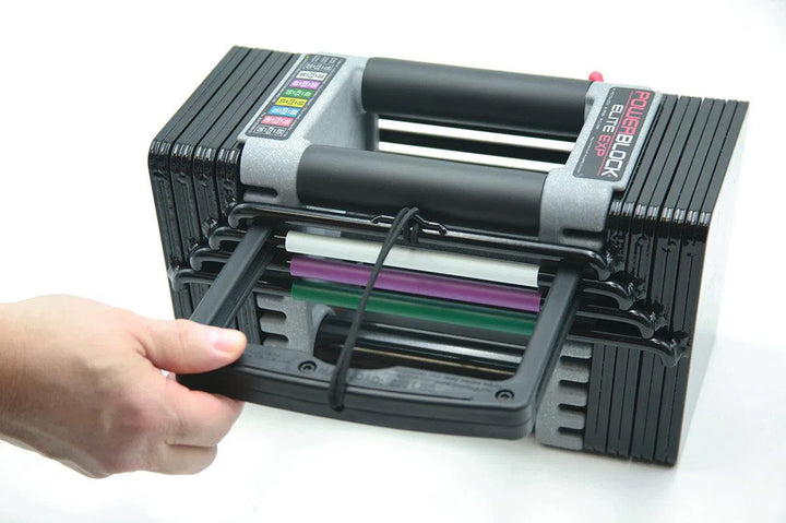 Adjusting PowerBlock 50 lb Adjustable Dumbbell Set