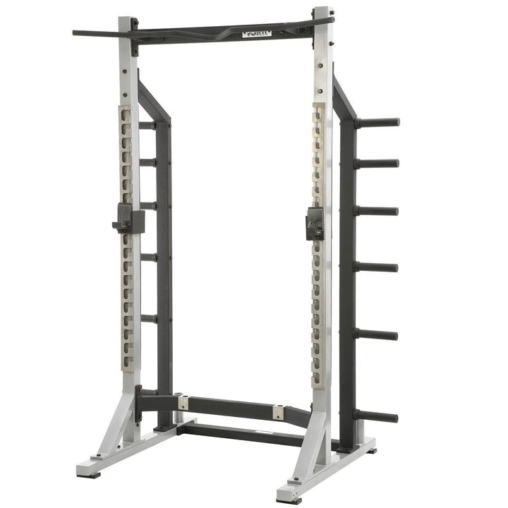 The York Barbell STS Self Standing Half Rack features a sturdy steel frame, pull-up bar, adjustable barbell holders, and side weight storage pegs. Its ideal for strength training with adjustable positions to suit your workout needs.