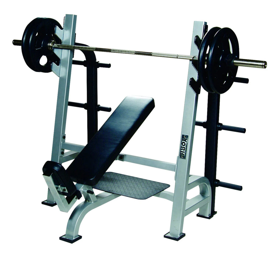 The York Barbell STS Olympic Incline Bench Press w/ 3 Bar Holders includes a barbell, weights, and a padded bench on a sturdy rack. Its adjustable seat pad ensures optimal positioning for targeting the chest, shoulders, and triceps during strength training.