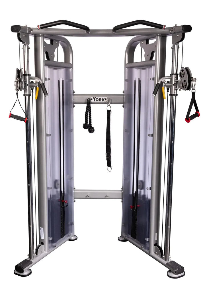 The York STS Functional Cable Crossover Machine by York Barbell features dual adjustable pulleys, a sturdy metal frame, and attached handles for versatile strength training. It includes a central pull-up bar and weight stacks on both sides, ideal for comprehensive fitness routines.