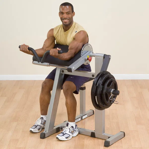 black man body solid dual bicep curl triceps extension machine
