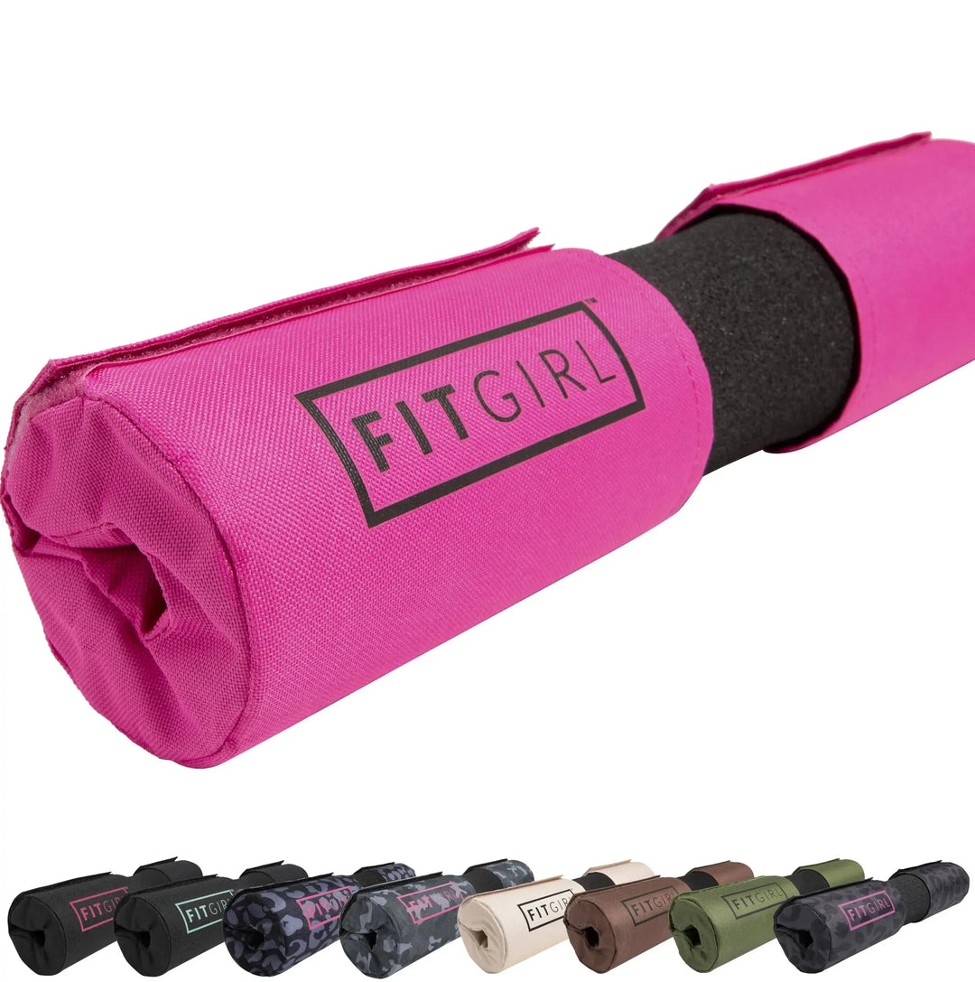 In the foreground is a pink FITGIRL Squat & Hip Thrust Barbell Pad with thick foam, revealing a black interior. Below are seven mini versions in various colors like camo, blue, and olive green. Crafted for women who value style and comfort while working out.