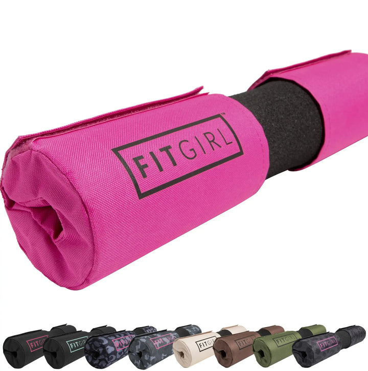 In the foreground is a pink FITGIRL Squat & Hip Thrust Barbell Pad with thick foam, revealing a black interior. Below are seven mini versions in various colors like camo, blue, and olive green. Crafted for women who value style and comfort while working out.