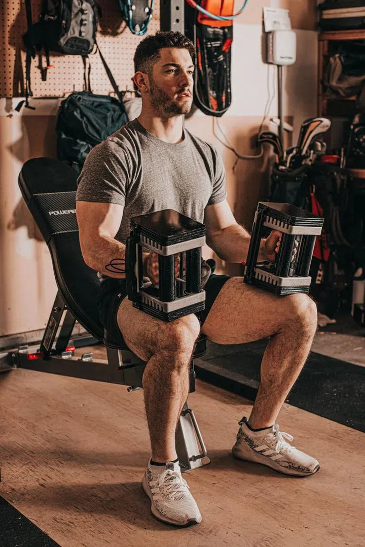 man workout on bench powerblock 90 lb adjustable dumbbell elite EXP90