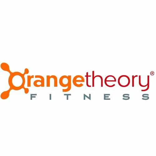 The image shows the Orangetheory Fitness logo. It features an abstract orange symbol resembling a molecular structure, followed by the words orangetheory in orange and FITNESS in gray.