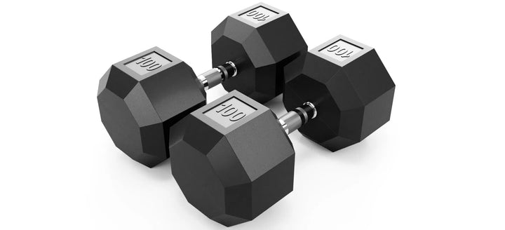 Two VTX Rubber Octagon Dumbbells, each weighing 100 lbs and featuring silver handles, lie parallel on a white surface. The black octagonal design helps reduce noise during workouts.