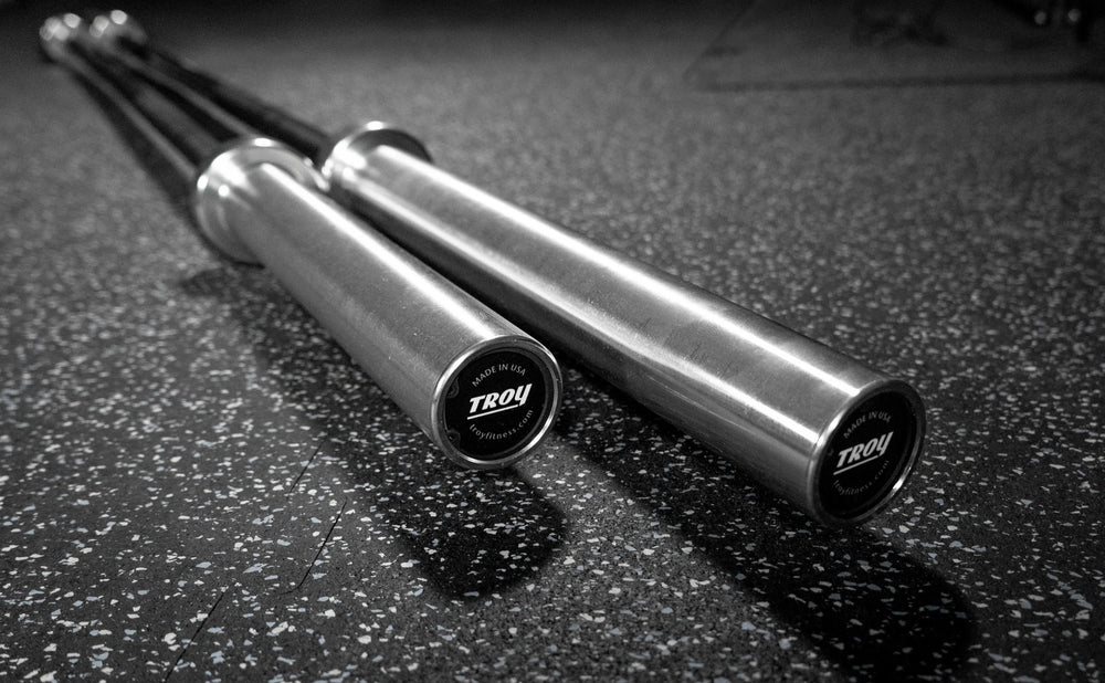 Troy Crossfit Barbell 1500C black option shown in a pair
