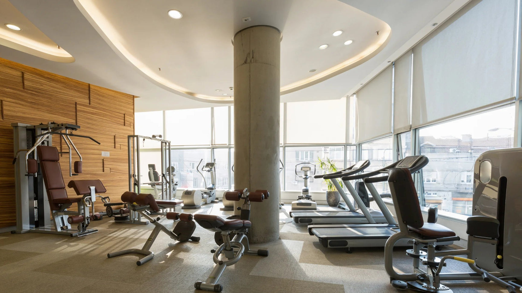 A hotel gym with no people using the equipment yet