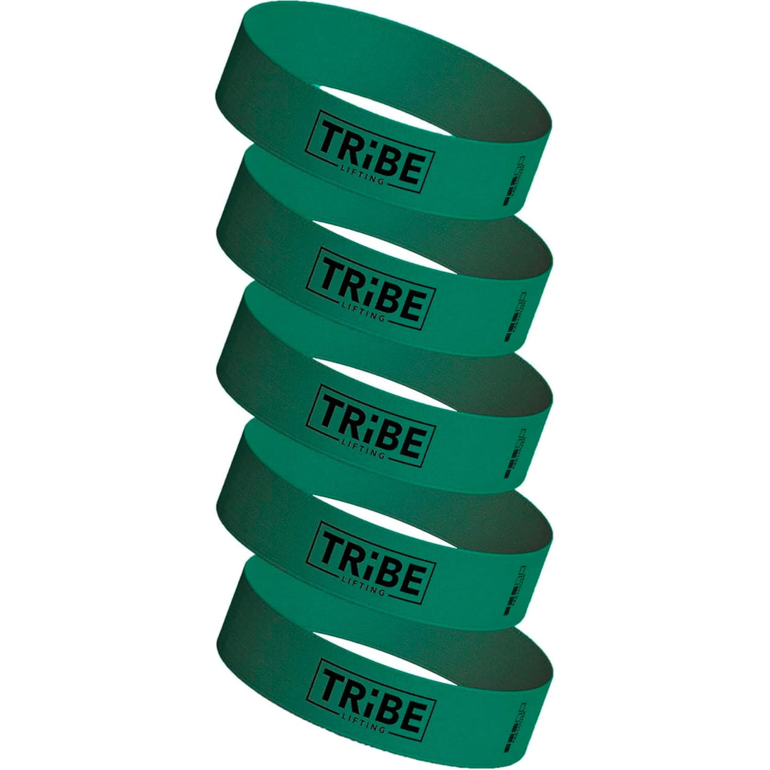 Five Tribe Fabric Resistance Bands for Booty Workout are stacked vertically, their green hue interrupted only by the bold, black Tribe logo.