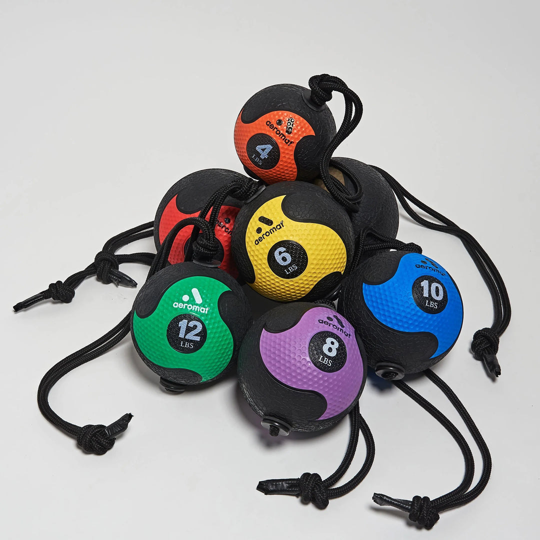 AeroMat Medicine Ball with Rope Set shown in 4, 6, 8, 10, 12, 15, and 18 lbs