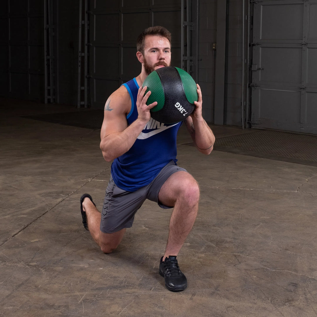 man lunge workout with Body-Solid Premium Medicine Ball BSTMB